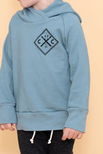 Load image into Gallery viewer, trademark raglan hoodie - ski team on rainwater (black)