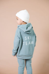 trademark raglan hoodie - ski team on rainwater