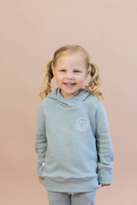 trademark raglan hoodie - smile patch on swell