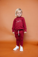 Load image into Gallery viewer, trademark raglan hoodie - magical on crimson